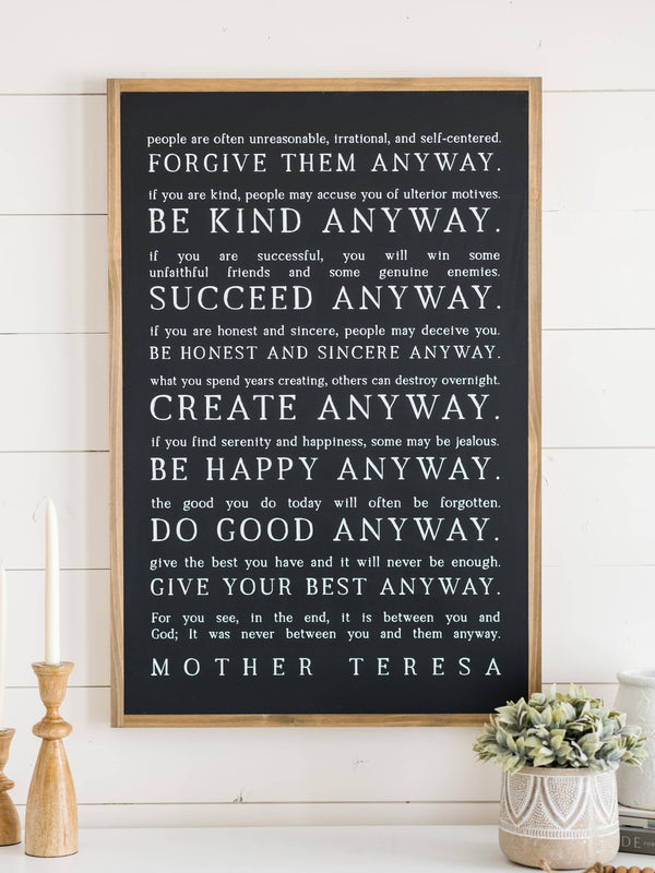 Love them Anyway | Mother Teresa | Wall Art: Soft White-Black Text / Light Brown Frame / 8 inches x 12 inches