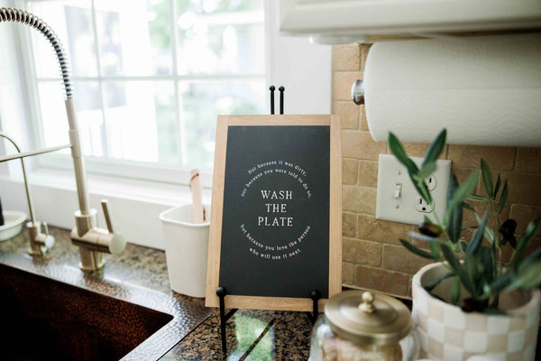 Wash the Plate | Wall Art: Soft White-Black Text / Light Brown Frame / 8 inches x 12 inches
