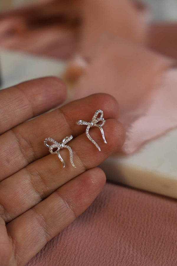 SILVER CZ BOW STUDS: Silver