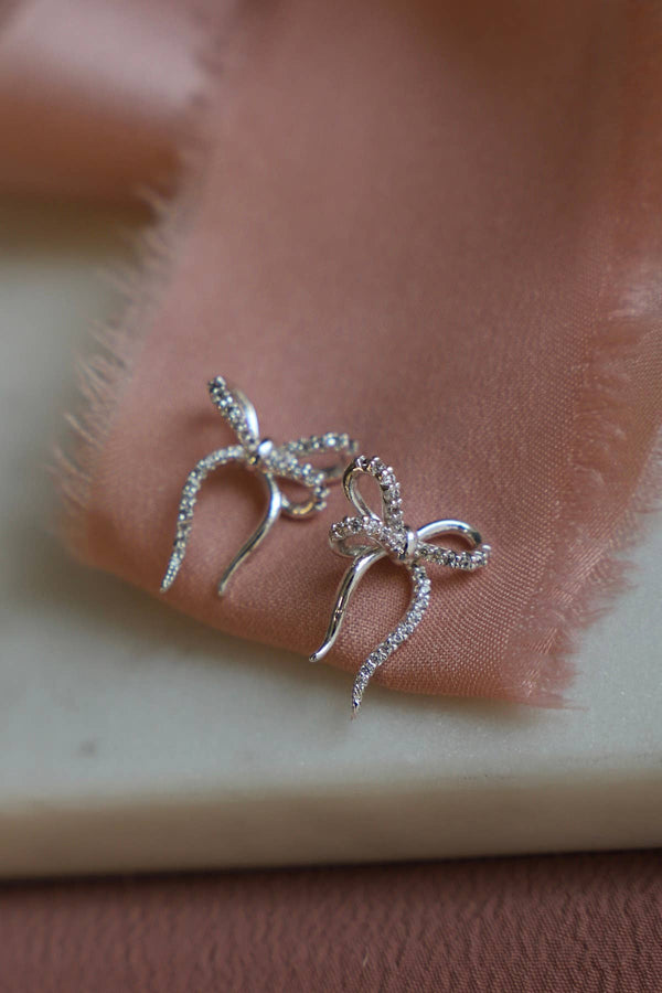 SILVER CZ BOW STUDS: Silver