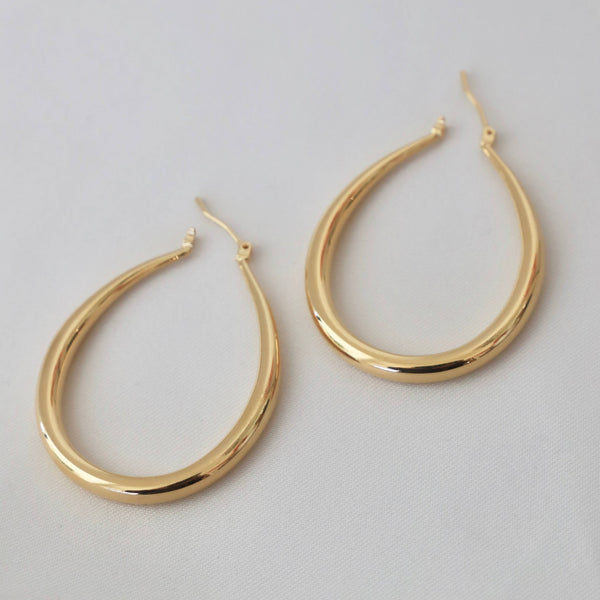 LARGE TEARDROP HOOP EARRINGS: GOLD